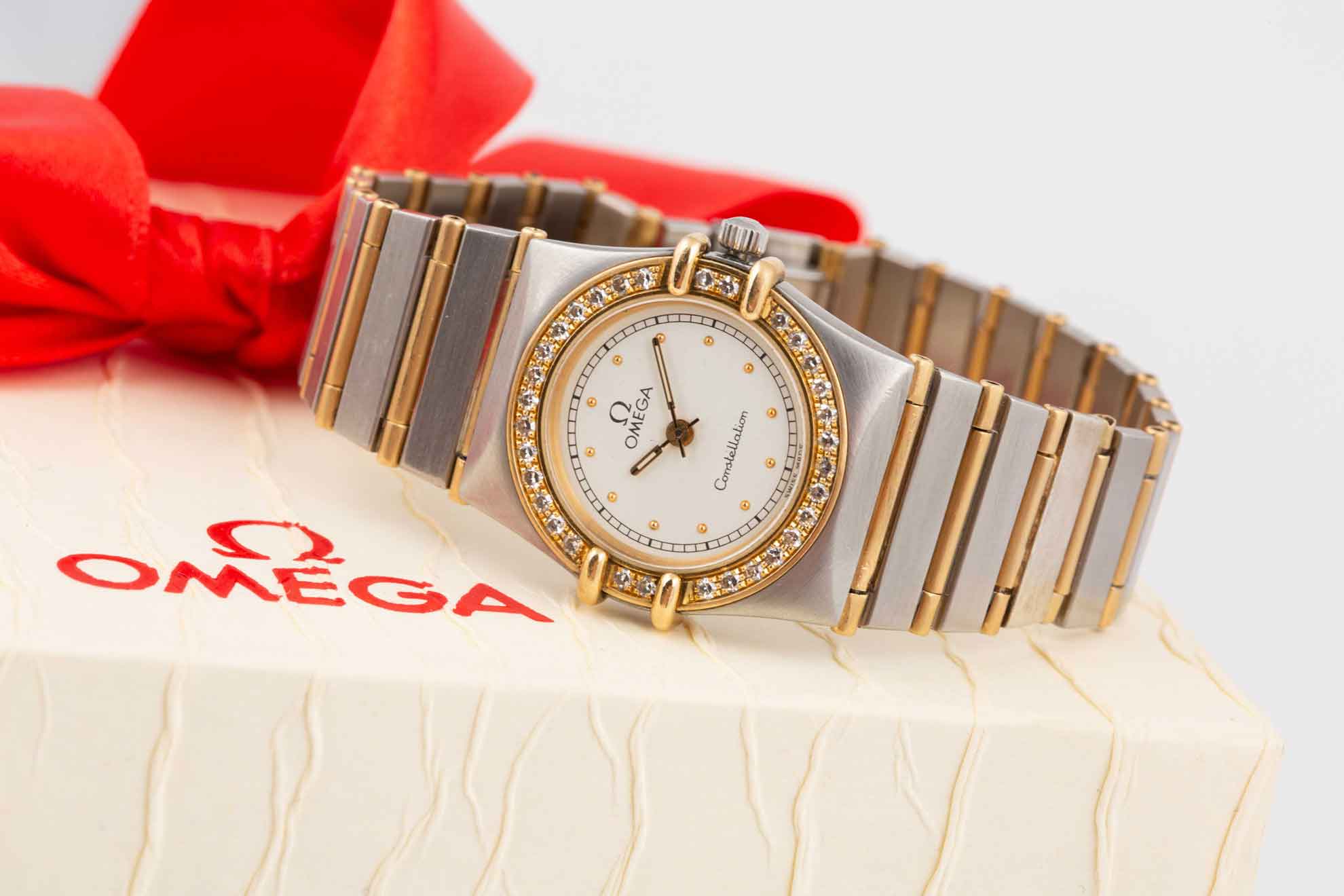 OMEGA CONSTELLATION ladies steel and 18crt gold sitting on watch box