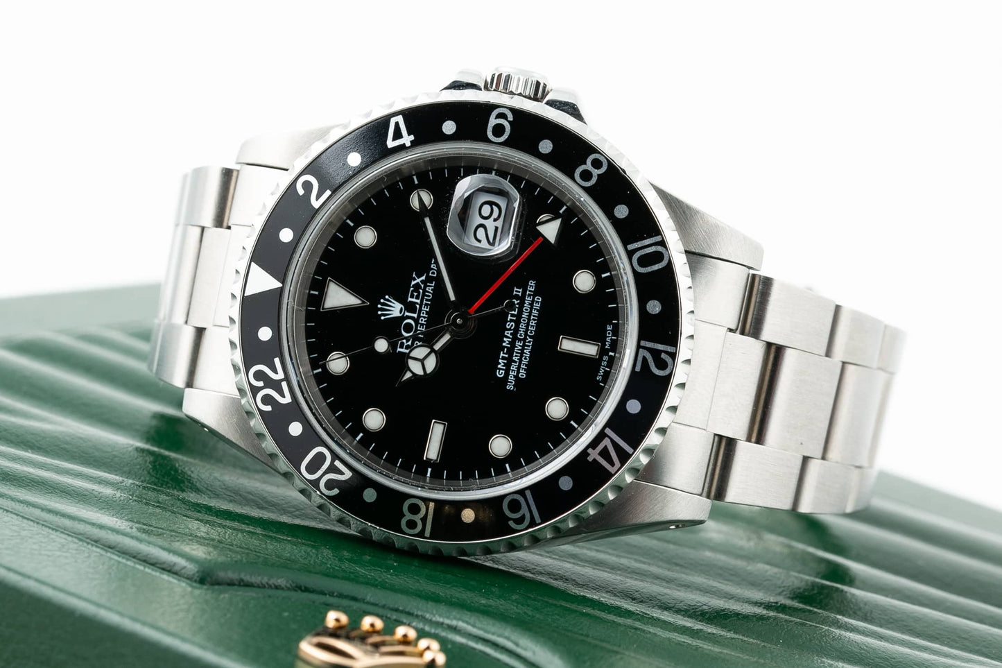 Rolex GMT Master II - 16710 in it sitting on top of the box 